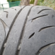 This is the drivers side front tire after ≈75,000 miles through all imaginable conditions. Thrashed, but still some life left.